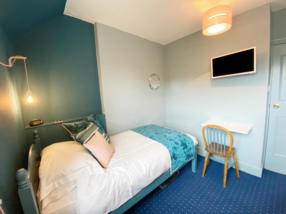 Single Room with Shared Shower and Toilet