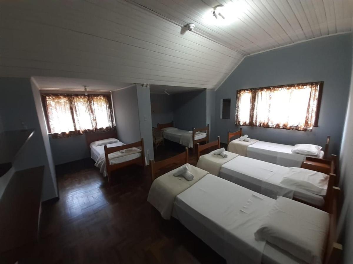 Quarto Quádruplo com Banheiro Externo Compartilhado