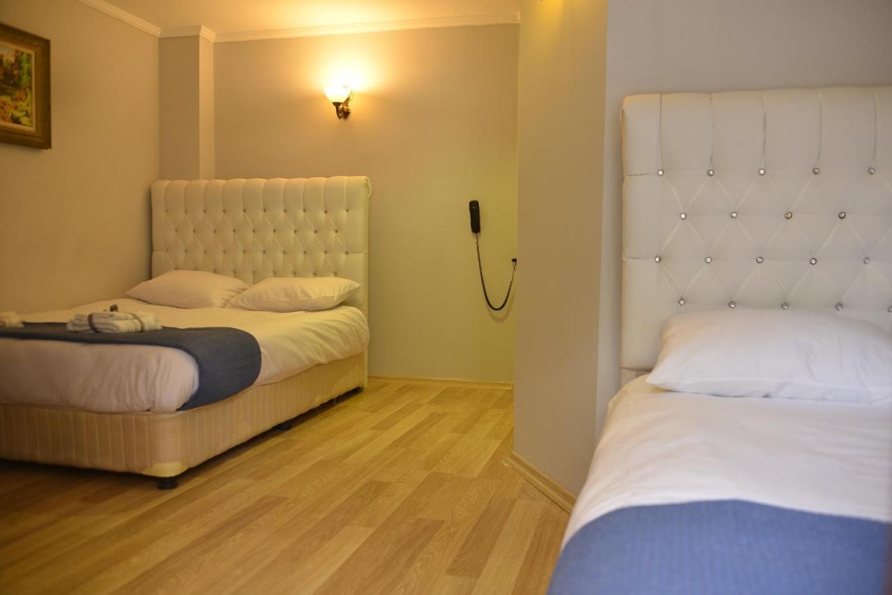Chambre Triple avec Balcon