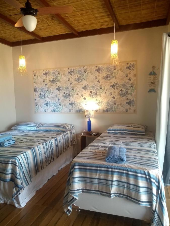 Dreibettzimmer mit Gartenblick