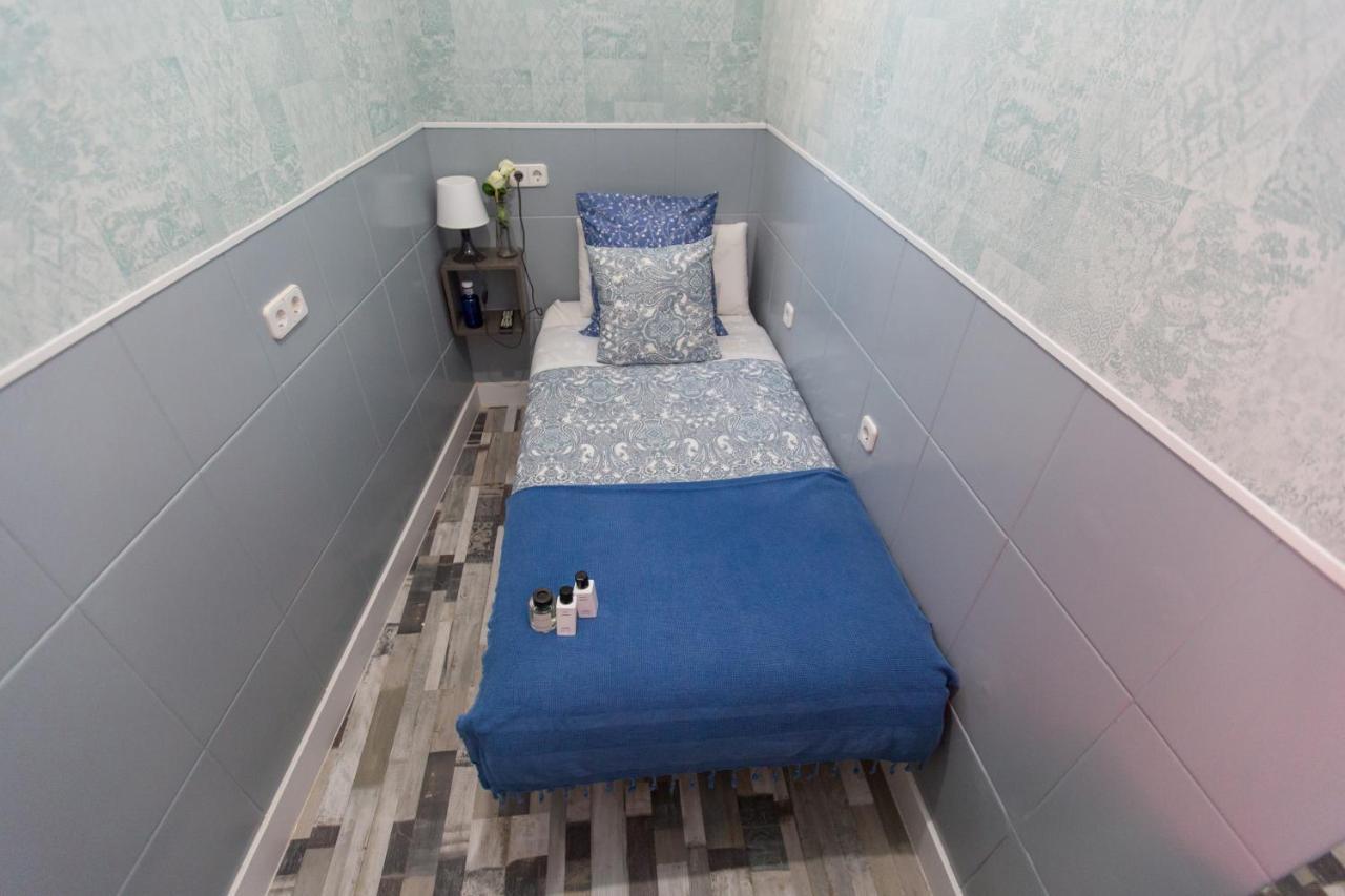 Camera Singola Budget con Bagno in Comune