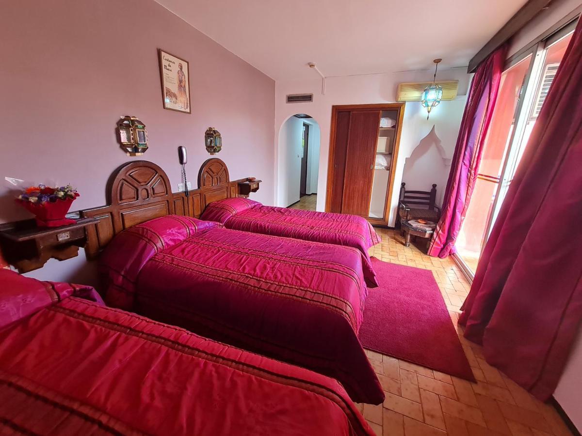 Dreibettzimmer mit Balkon