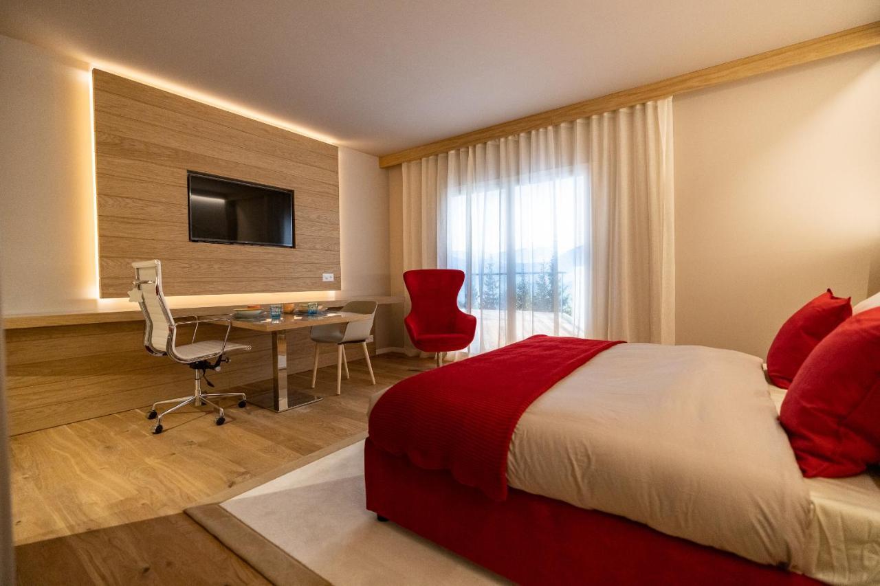 Deluxe Junior Suite mit Kochnische und Terrasse – Innenhofseite