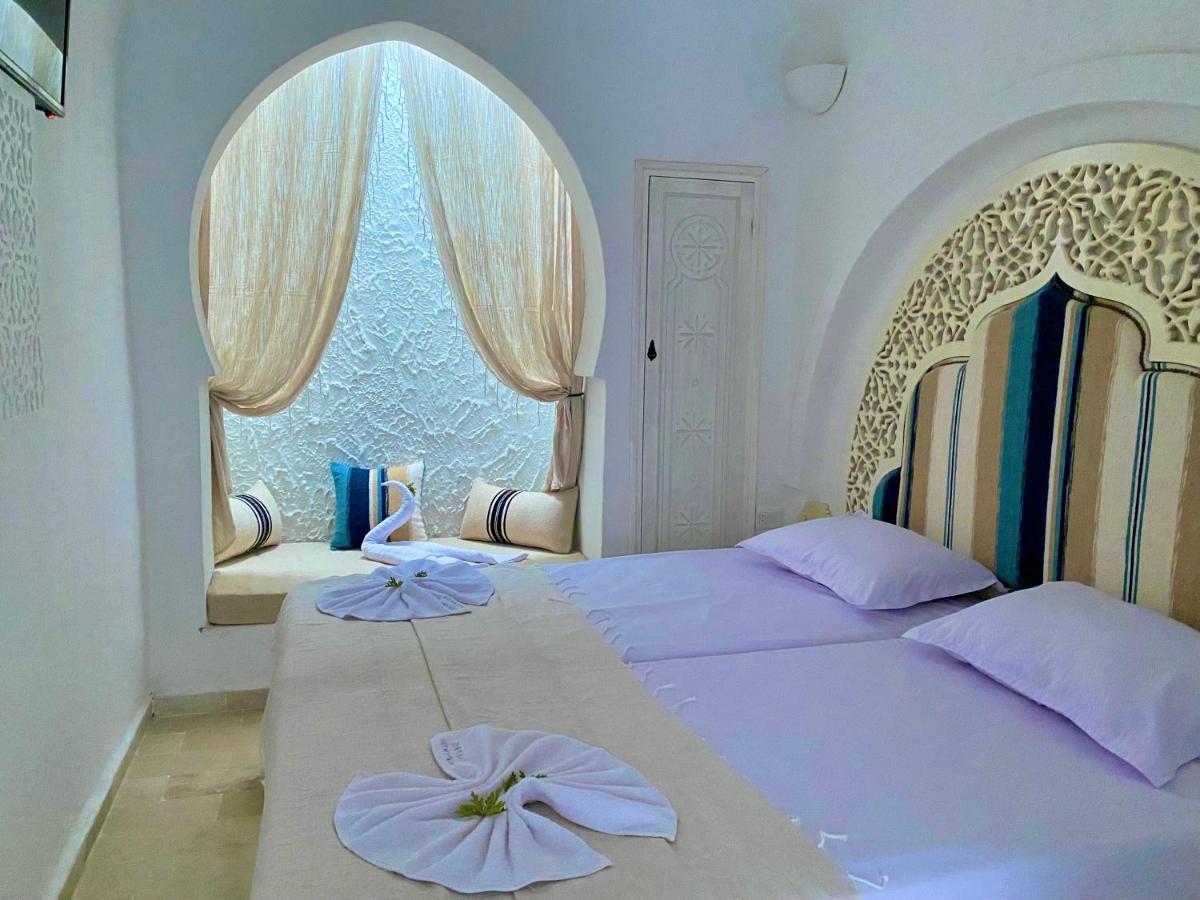 Chambre Deluxe (2 Adultes + 1 Enfant)