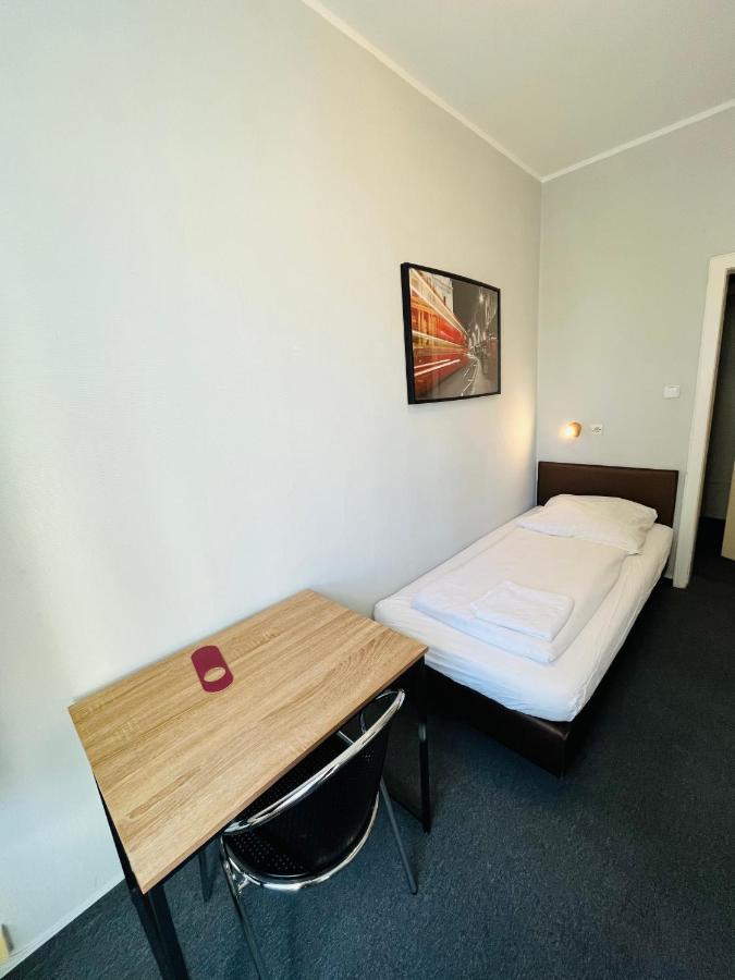 Eenpersoonskamer met Gedeelde Badkamer