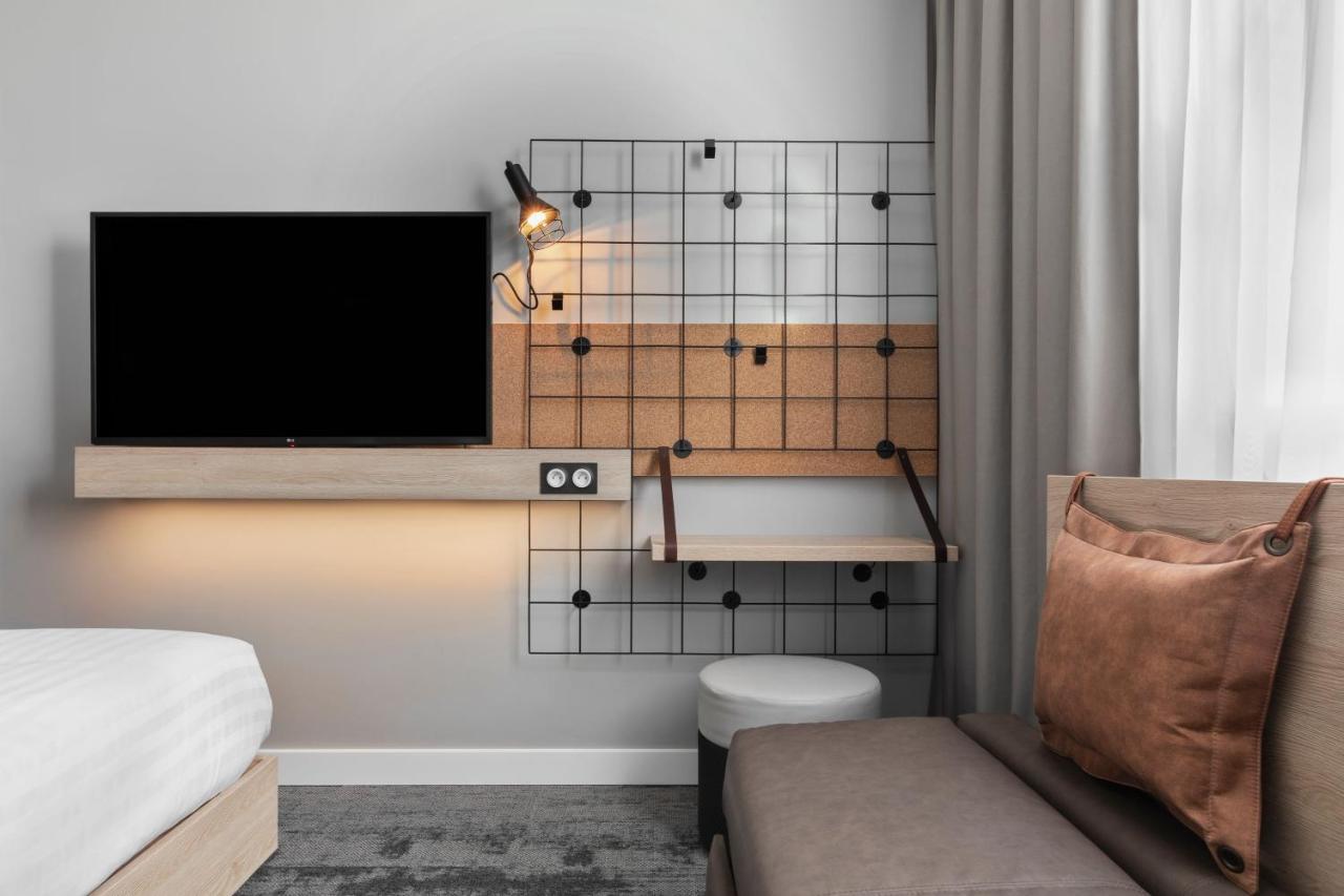 Familienzimmer mit einem Queensize-Bett und einem Schlafsofa