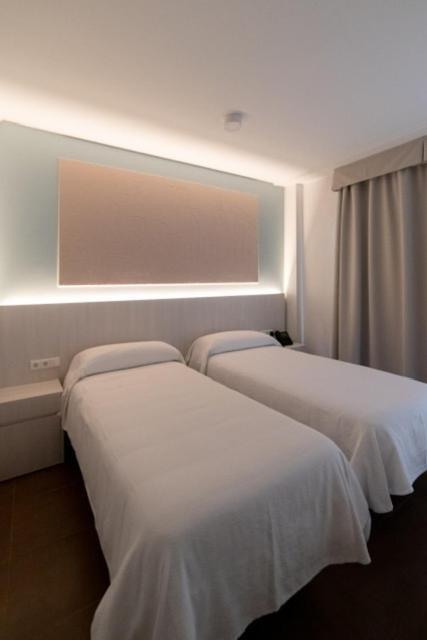 Tweepersoonskamer met 2 Aparte Bedden
