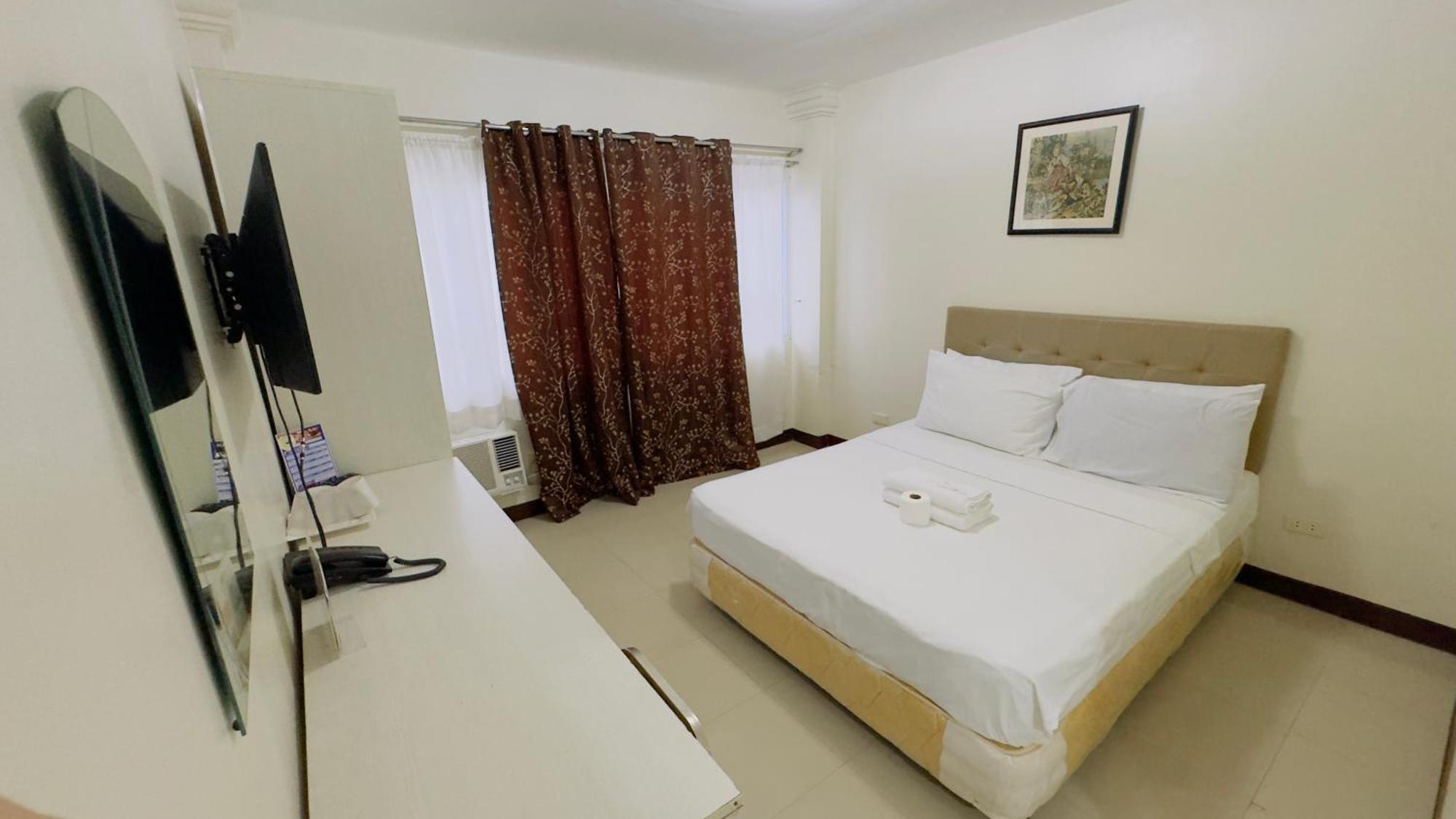 Zimmer mit Queensize-Bett