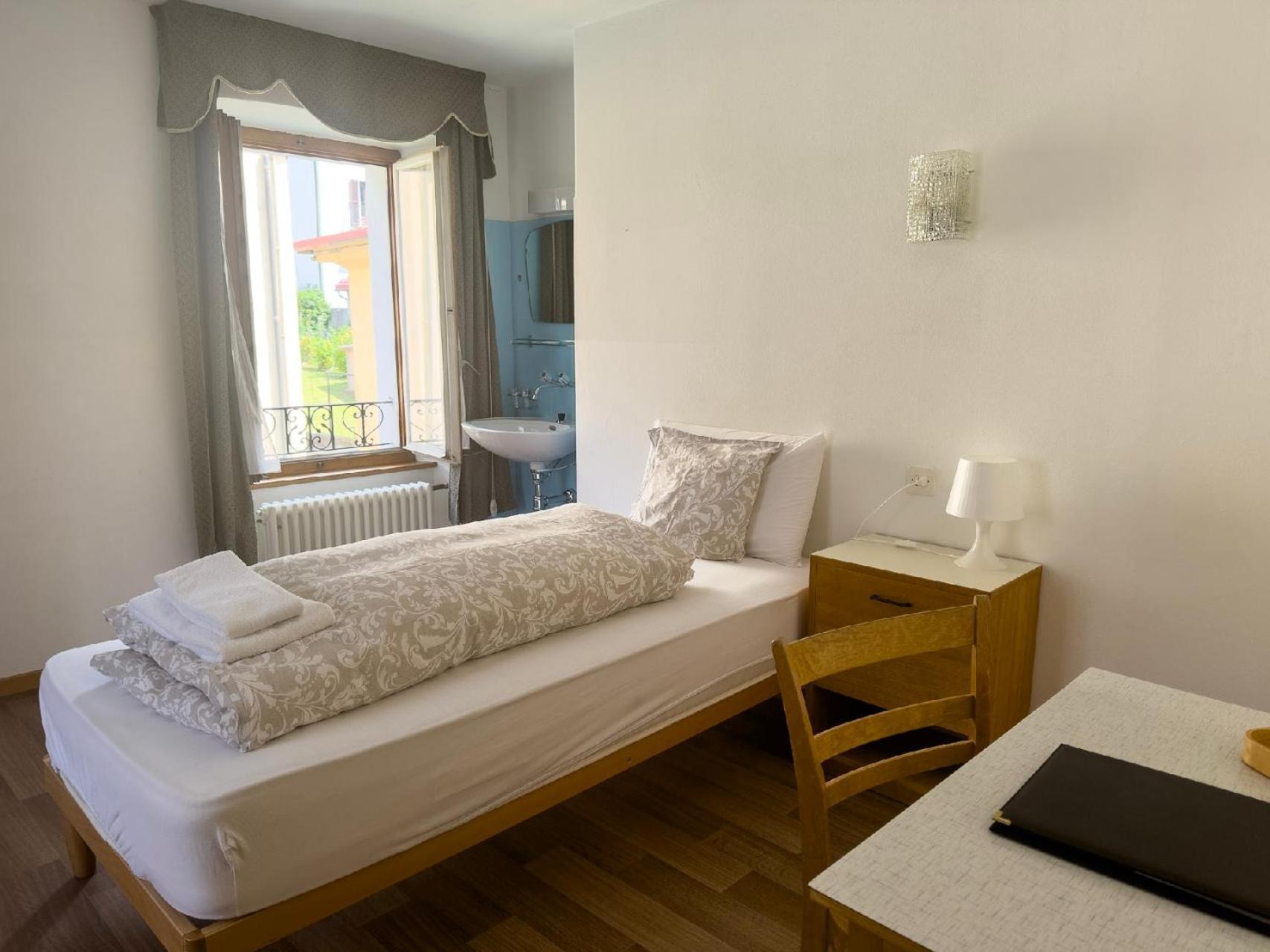 Eenpersoonskamer met Gedeelde Badkamer