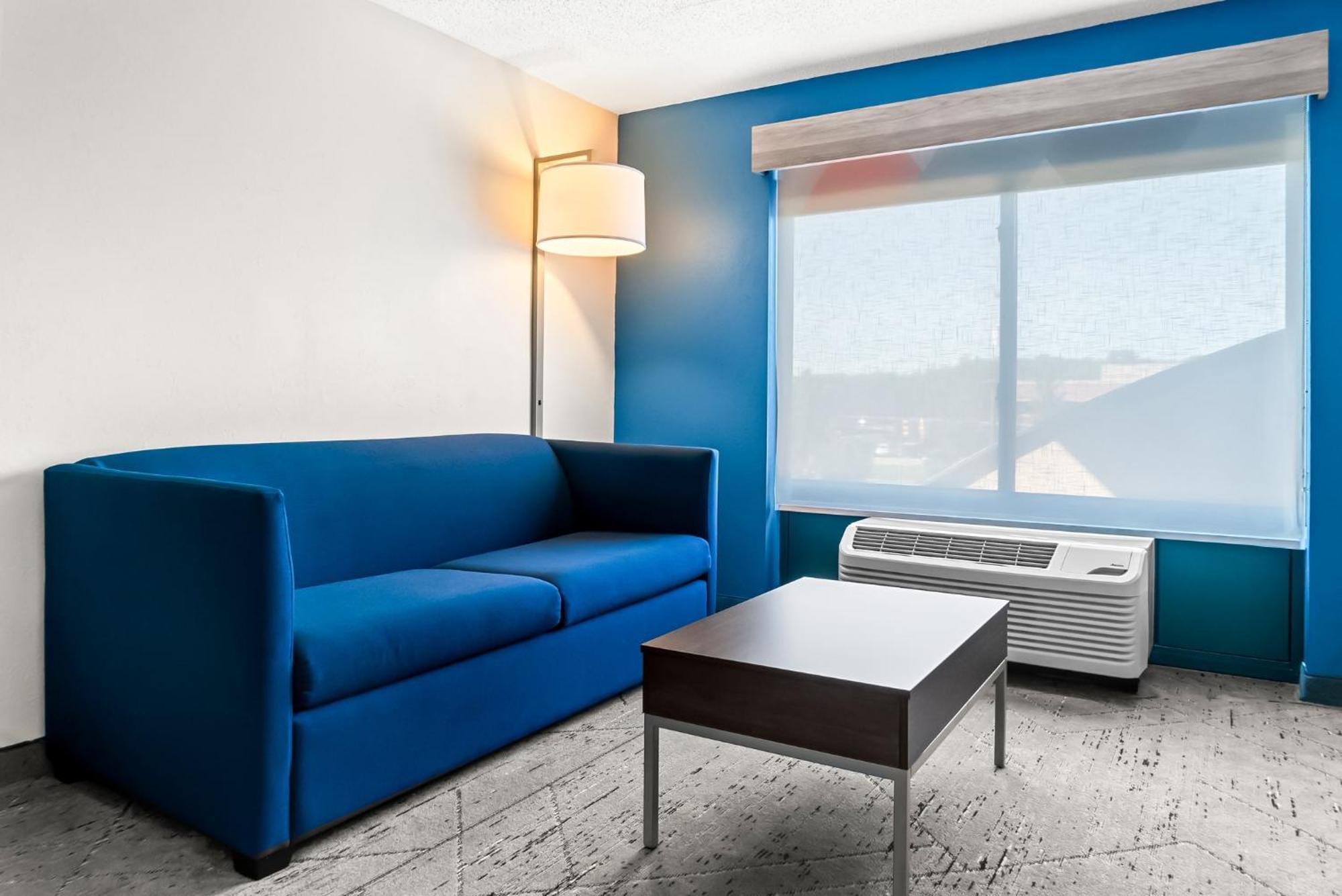Queen Suite with Two Queen Beds and Sofa Bed