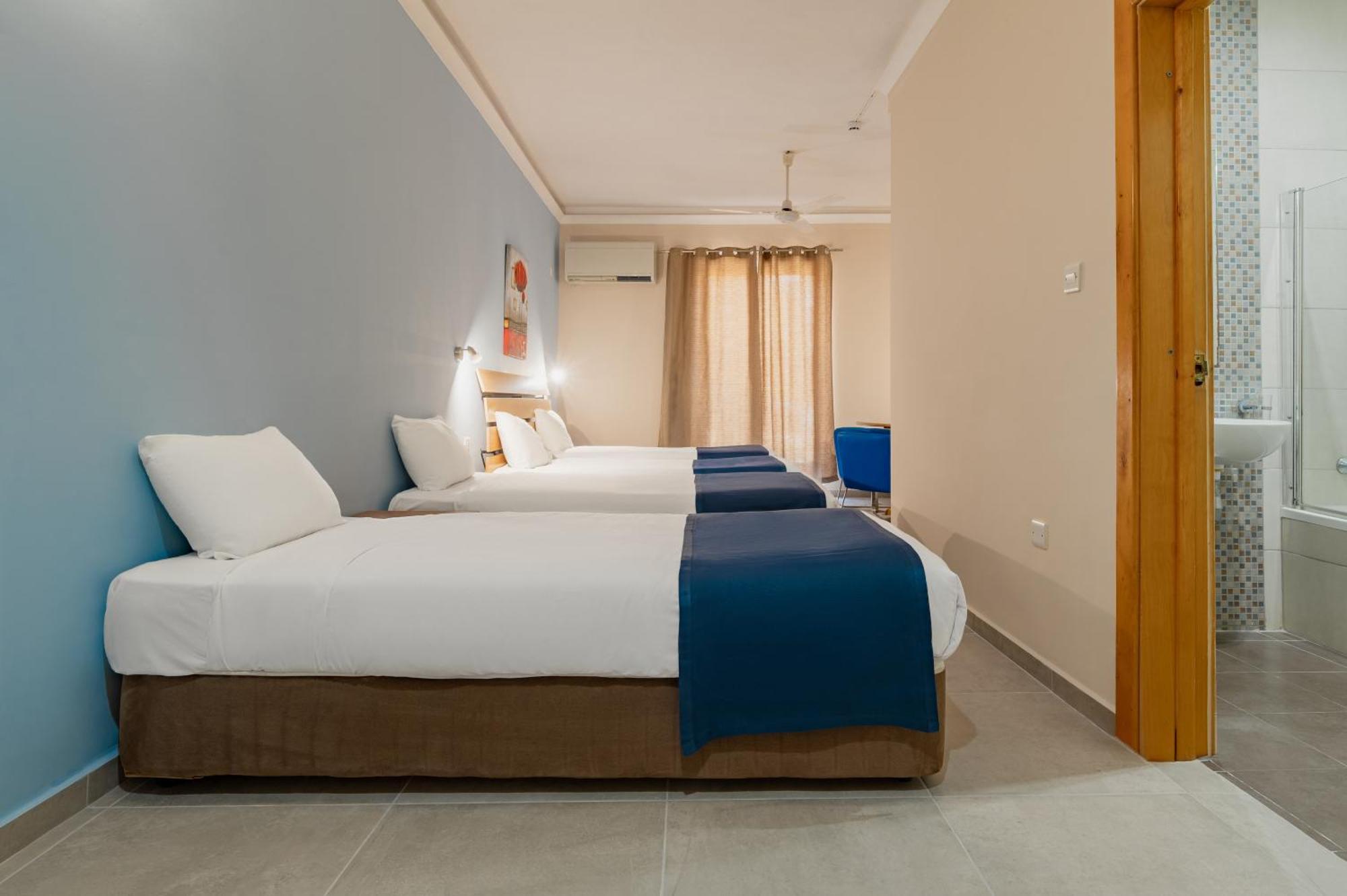 Chambre Quadruple - Vue sur Terres