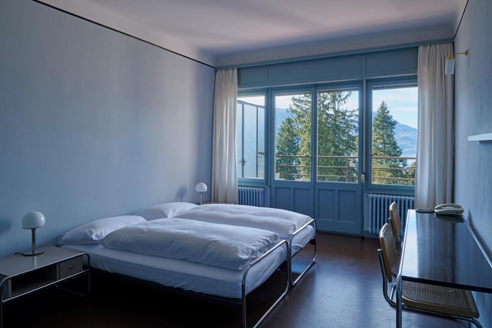 Chambre Confort Lits Jumeaux avec Balcon et Vue sur Lac