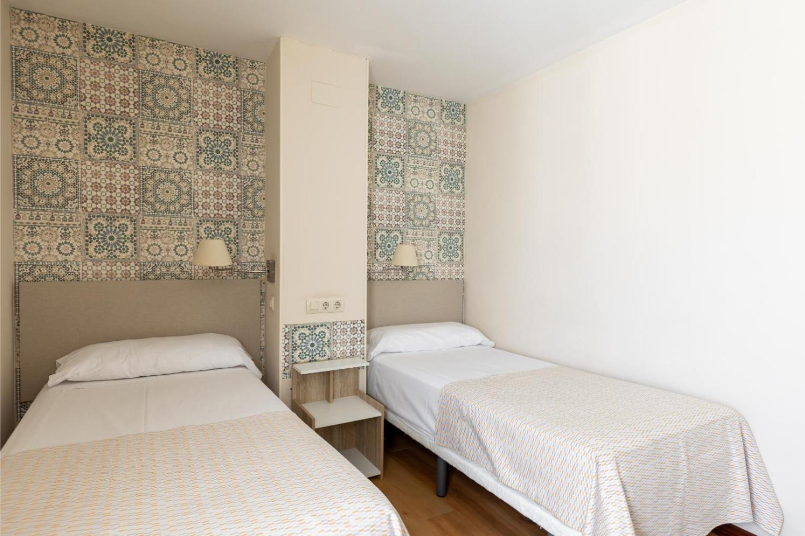 Tweepersoonskamer met 2 Aparte Bedden