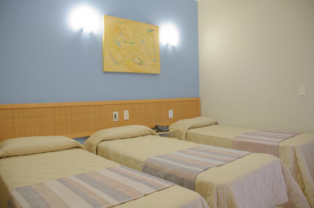 Quarto Triplo Standard com Varanda