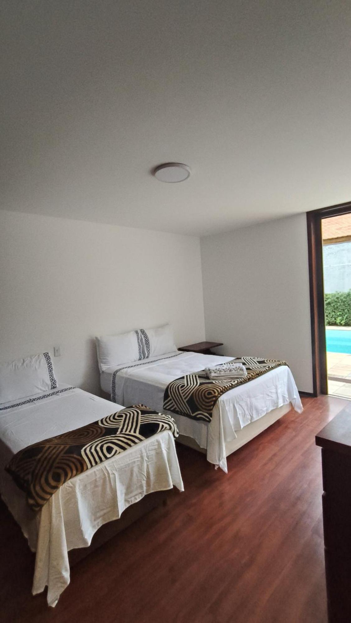 Suíte com Vista para a Piscina