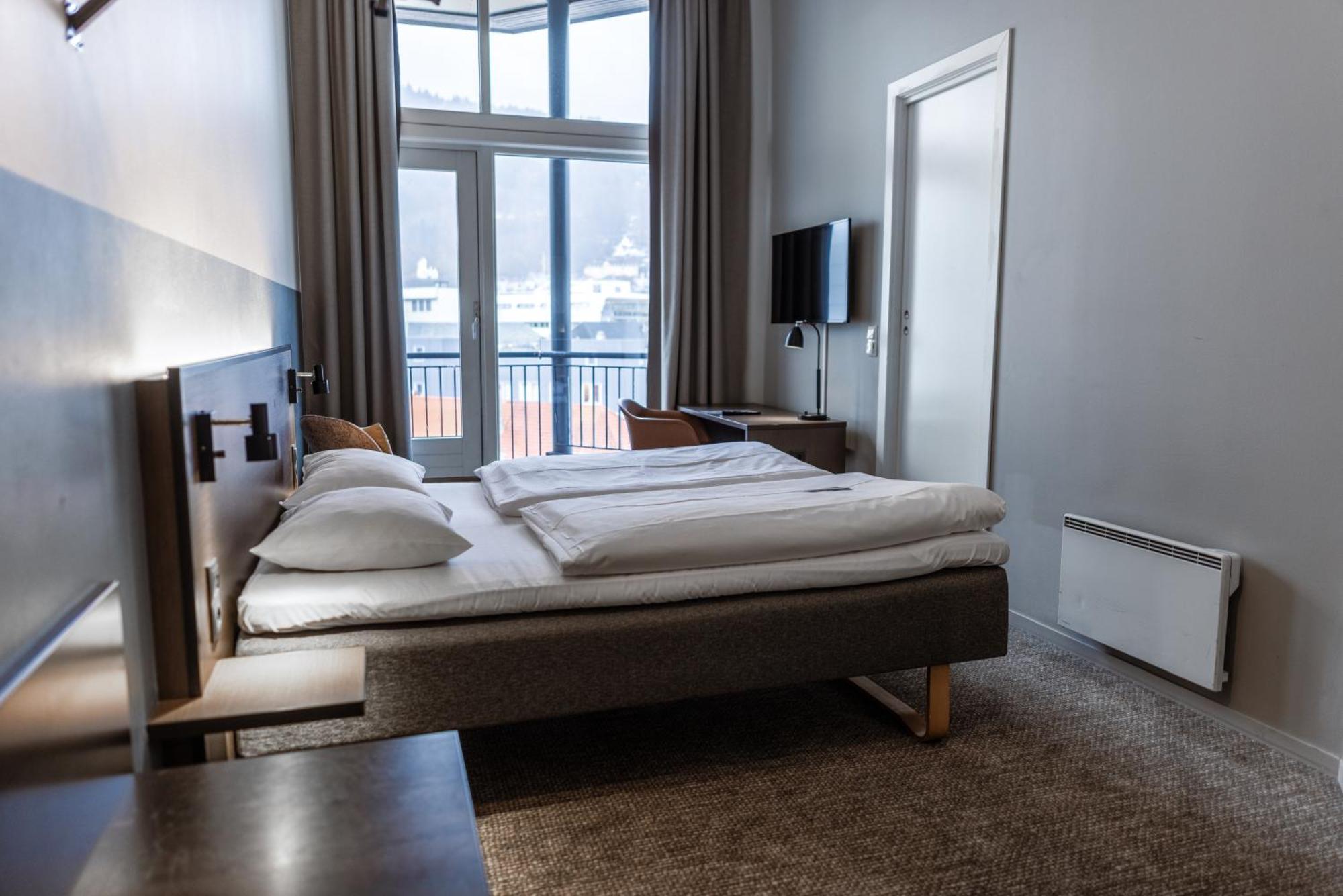 Kamer met Queensize Bed en Balkon