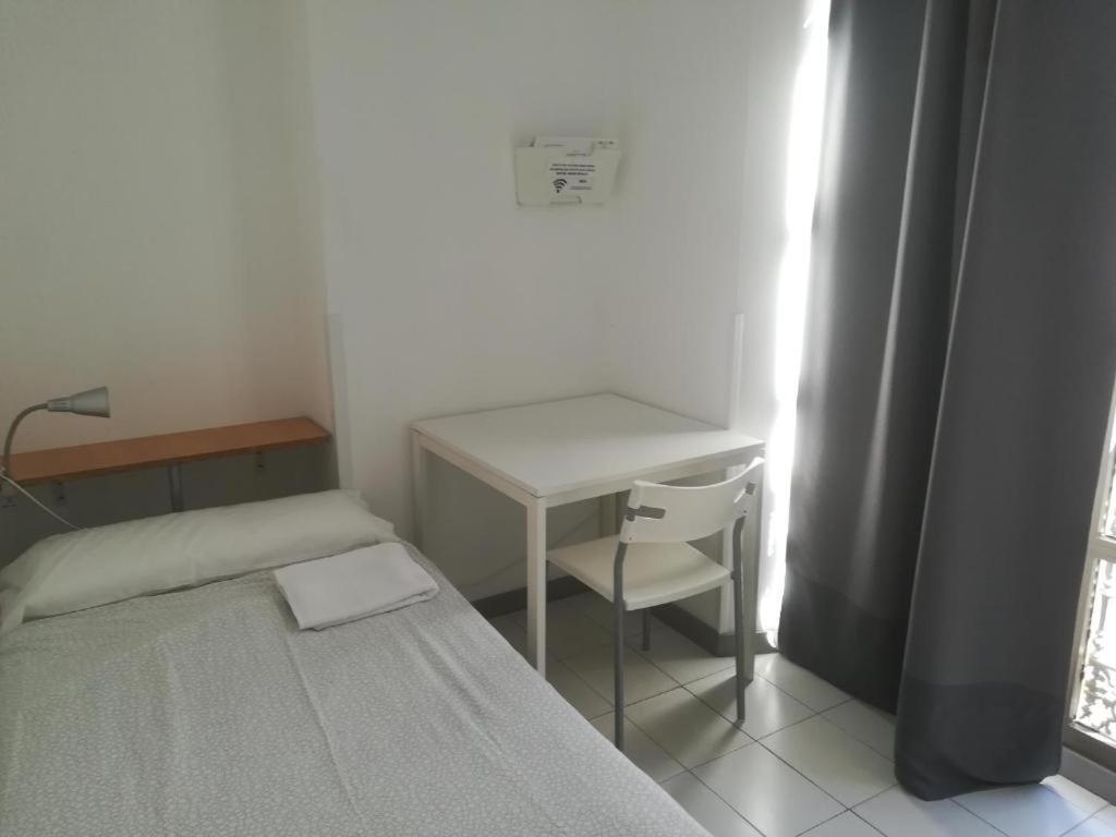 Camera Singola con Bagno in Comune