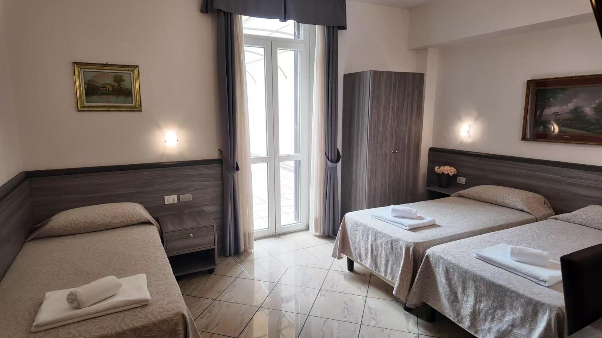Chambre Triple avec Terrasse