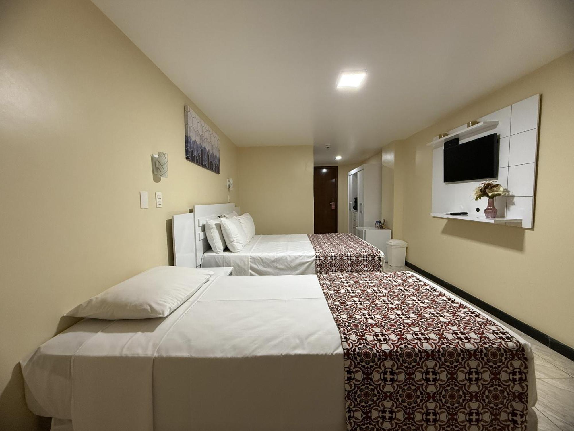 Quarto Triplo com Cama de Casal