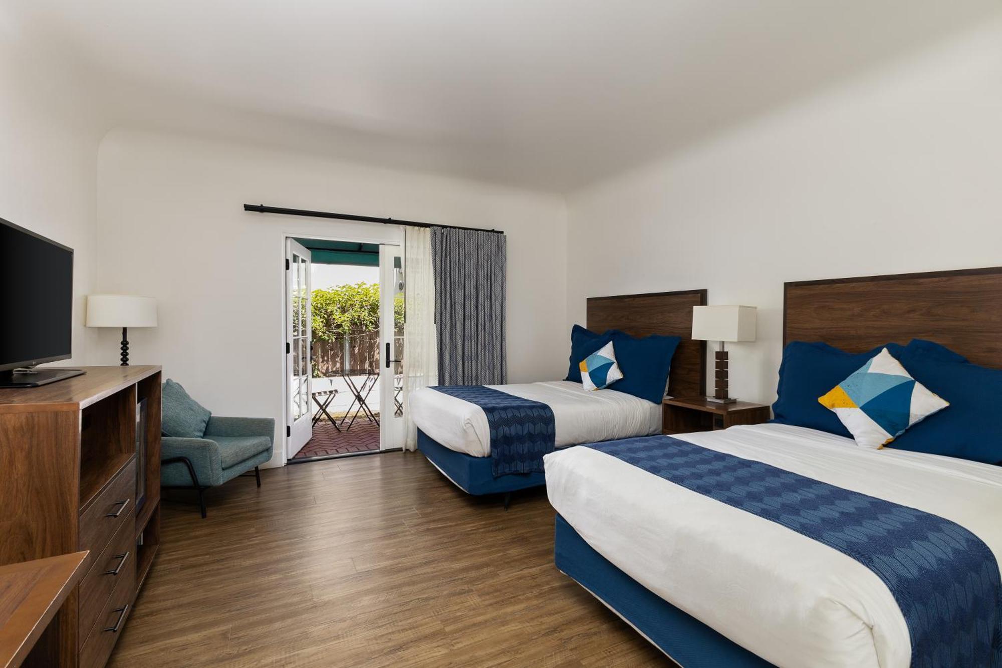 Room 2 Double Beds Roll Shower Patio Accessible