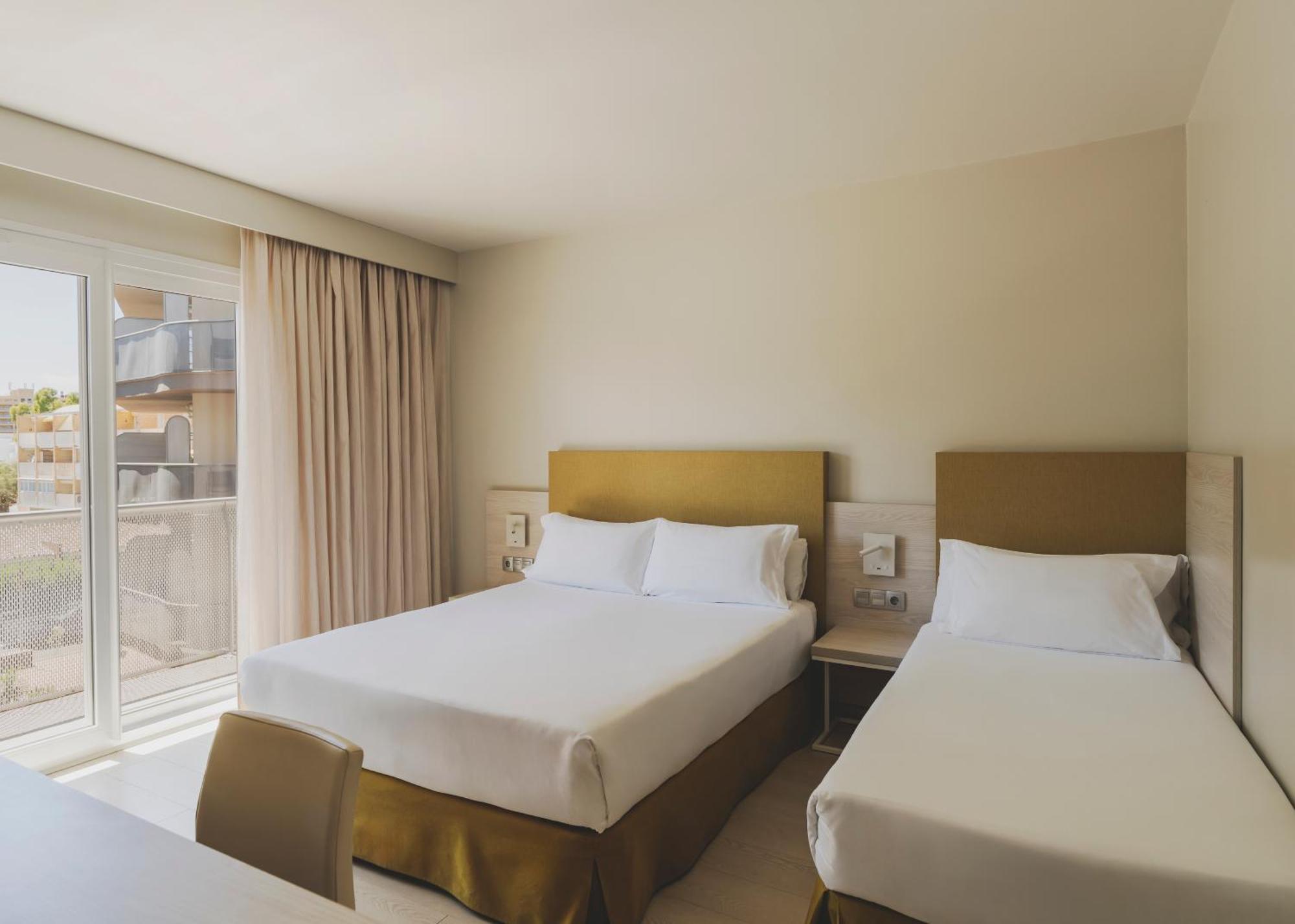 Triple Room (2 Adults + 1 Child)