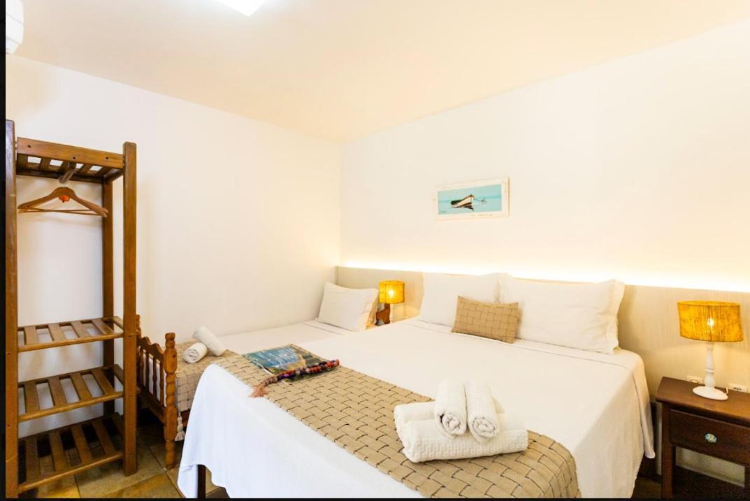 Quarto Triplo com Vista para a Piscina