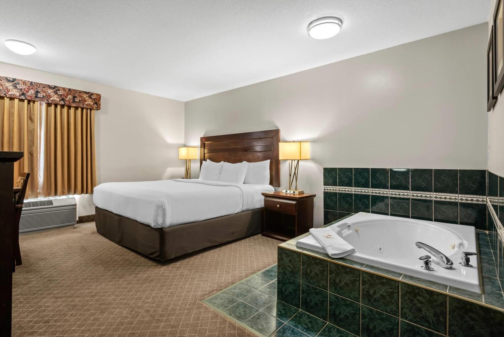 Kamer met Kingsize bed en Bubbelbad