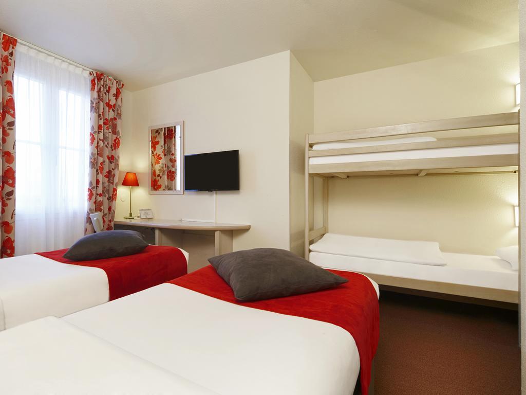 Habitación Estándar con 2 camas individuales y literas (1-4 adultos)