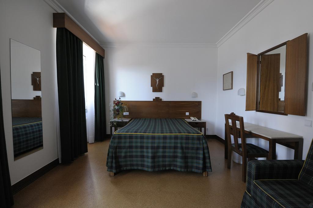 Quarto Duplo