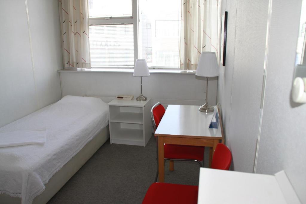 Camera Singola con Bagno in Comune
