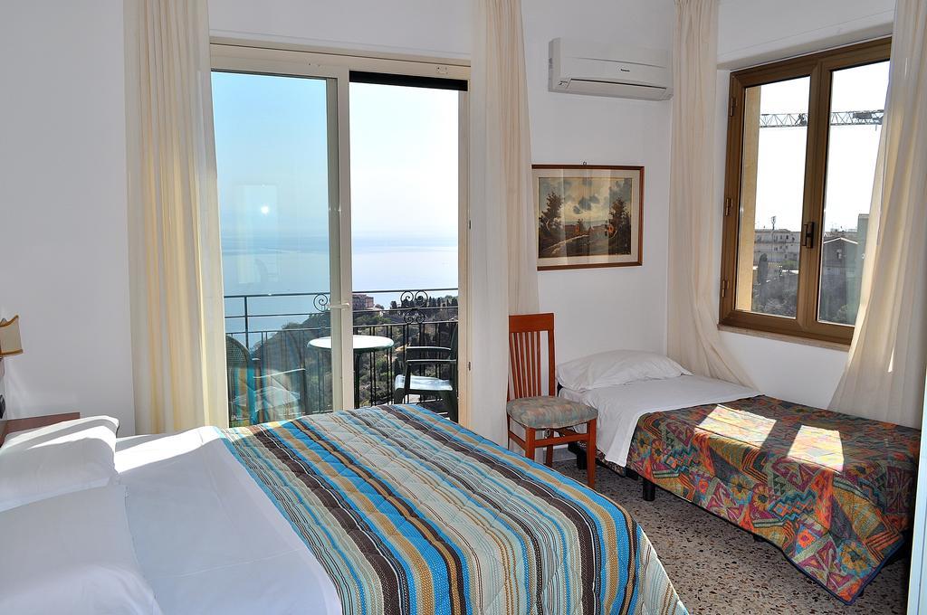 Double Room with Extra Bed and Sea View,1580318209:JPEG