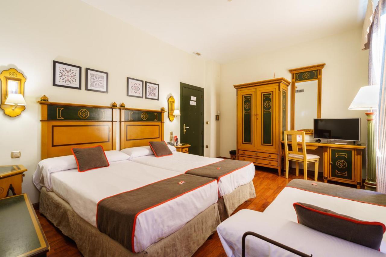 Quarto Twin com Cama Extra