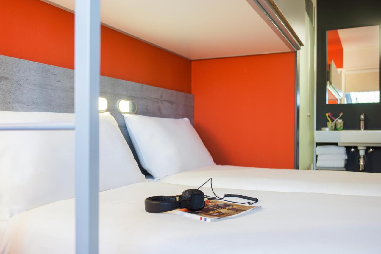 Quarto Standard com 2 Camas Individuais e 1 Beliche