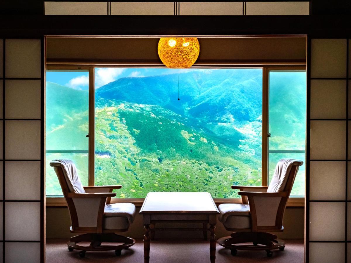 Twin bed Compact Japanese and Western style room with Mountain View
