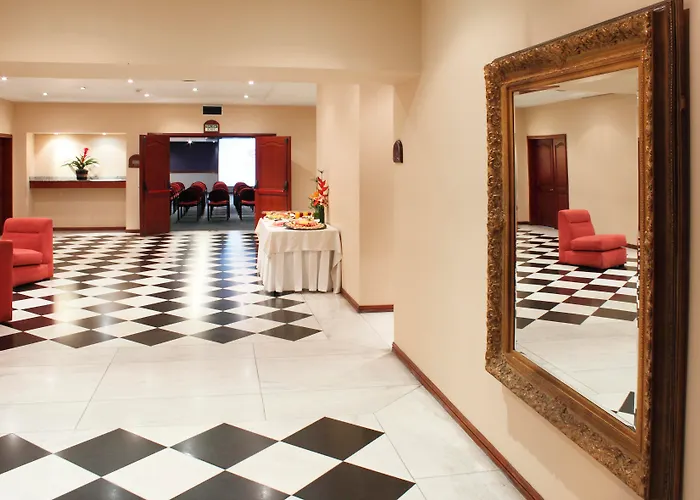 Hoteles con Jacuzzi Windsor House Inn By Geh Suites